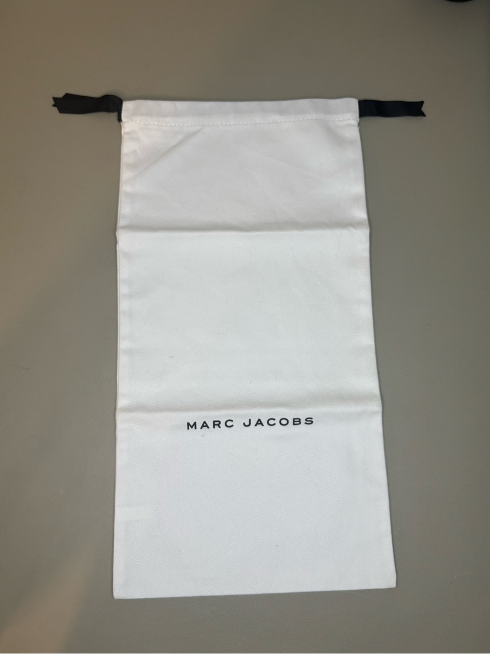 Authentic Marc Jacobs White Dustbag Black Drawstring Solid Size 16.5х8.5 inches.